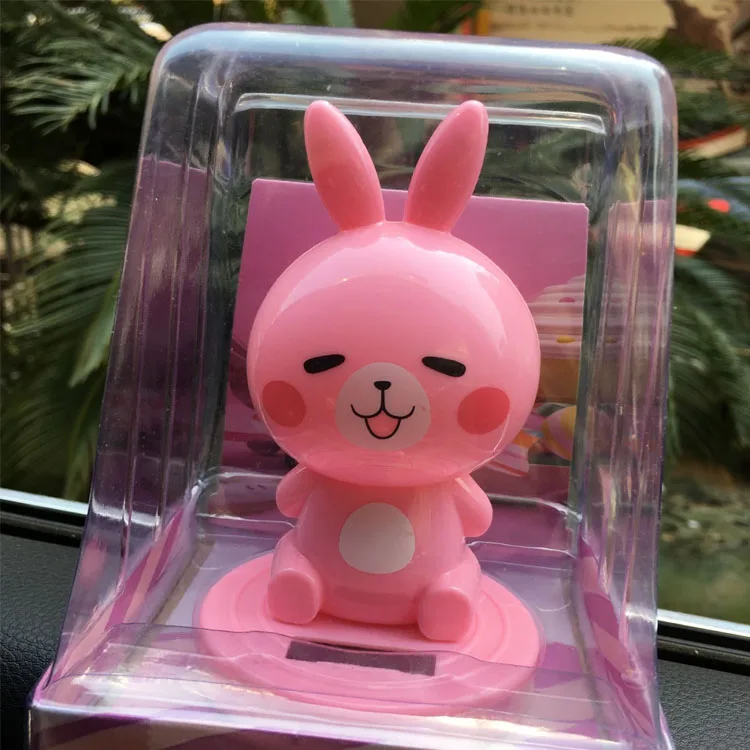 Creative car decoration smile Stitch solar cute shaking head doll car accessories