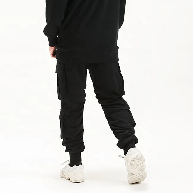 Stock usa street multi pockets zipper solid color pants elastic drawstring casual jogger pants mens popular sweatpants wholesale