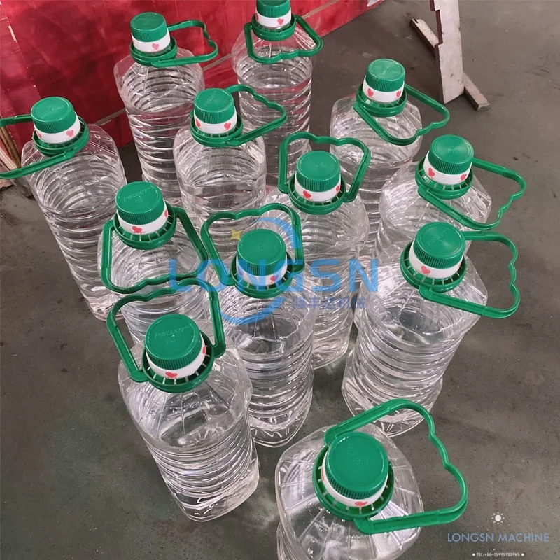 Customized automatic high speed beverage PET bottle handle applicator machine