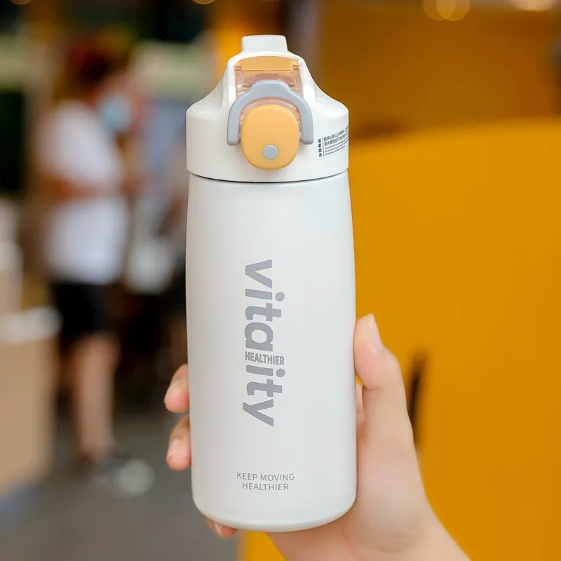One-handed opening suction nozzle type thermos cup stainless steel bouncing lid sports water bottle