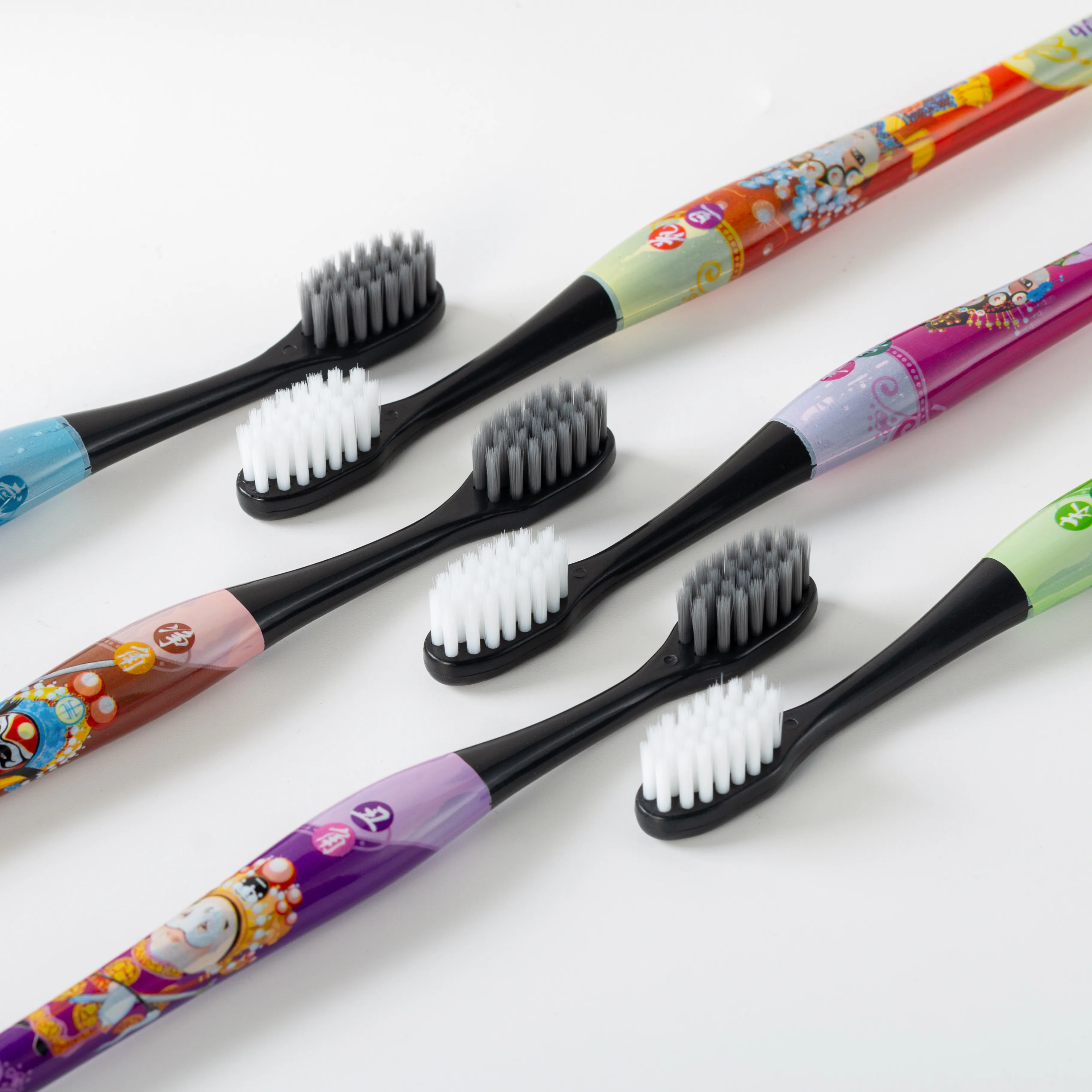 High quality ISO CE ROHS  approved charcoal bristles toothbrush  Wholesale OEM free sample Customized massage gum non bleed