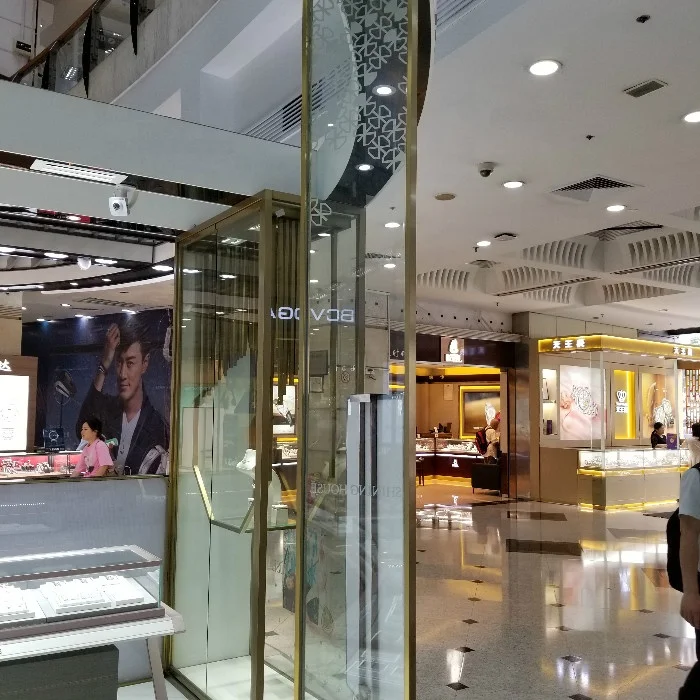 
Customized Metal Bronze Color Retail Display Rack Clothes Cabinet 