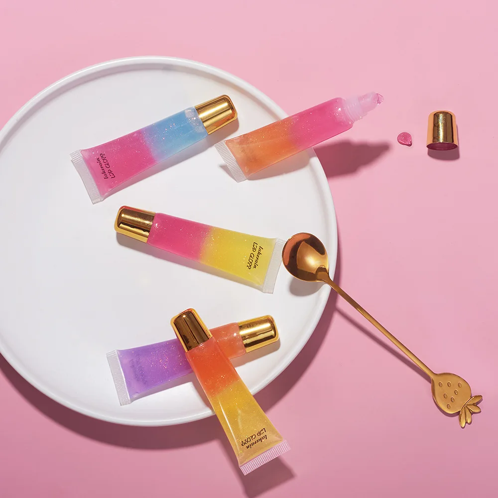 OMG private label two color lip plumping gloss clear shiny soft tube shimmer squeeze tube plump lip gloss