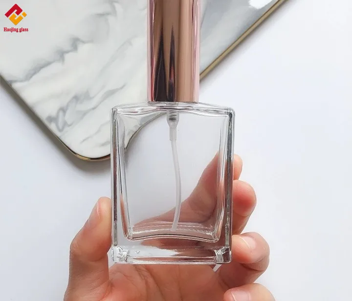 Customized Cosmetic Parfum Clear Square Spray Bottle Glass And Rose Gold Cap