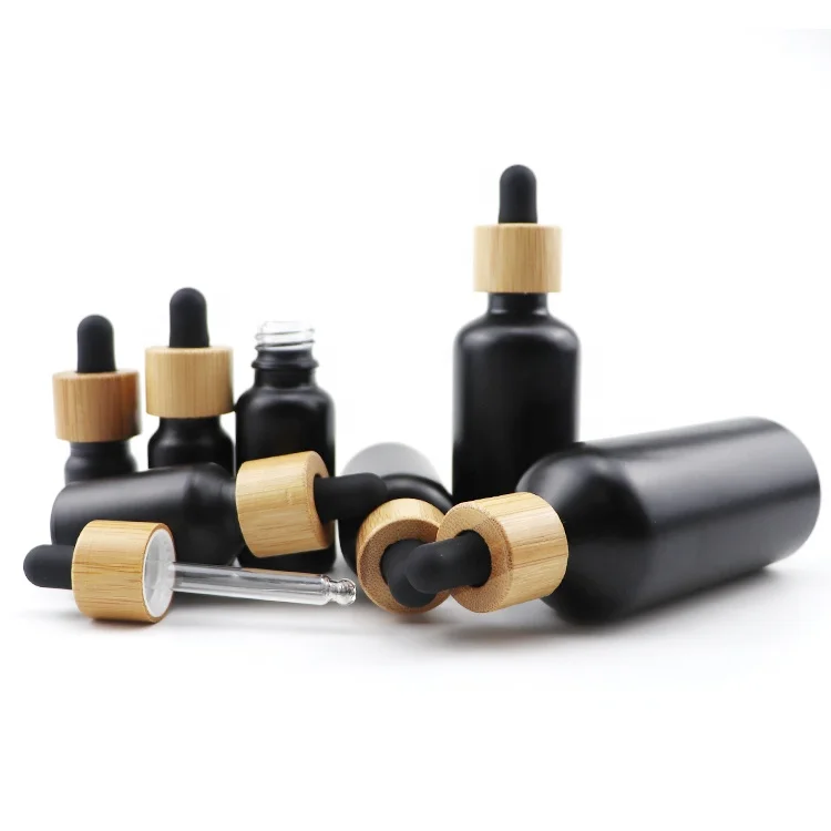 luxury empty packaging cosmetics bamboo 10 ml round black bottles 10ml glass essential oil dropper bottle for essential oils