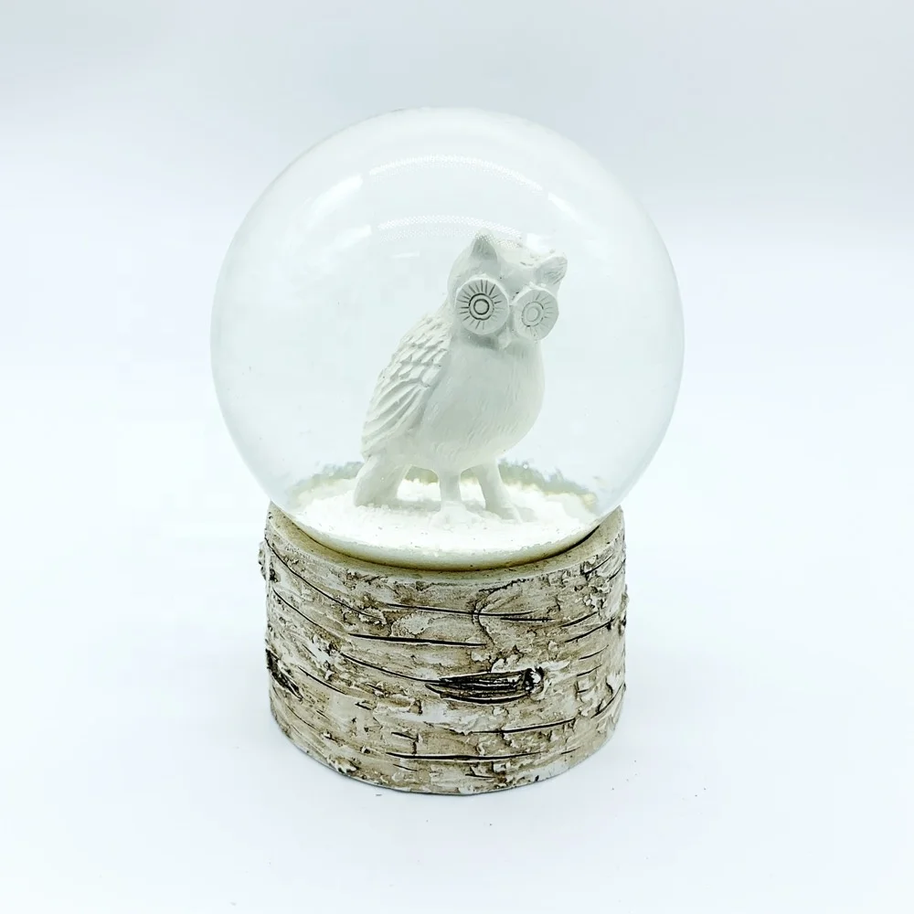 Wholesale animal theme 100MM resin craft glass snow globes with white owl bird inside for christmas decorations