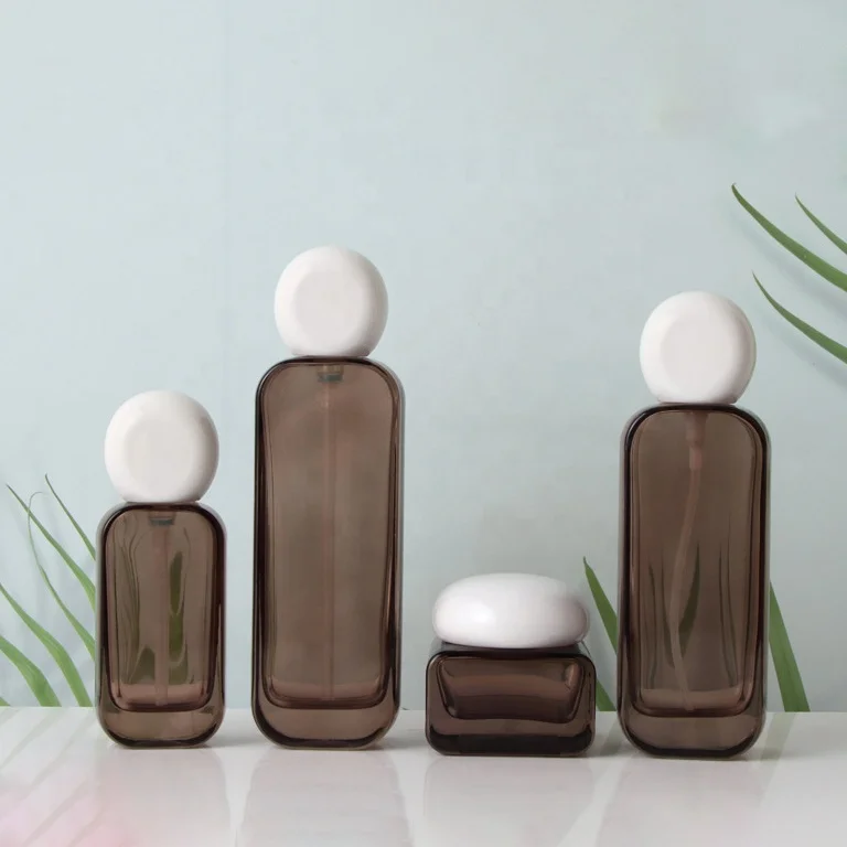 Wholesale clear black cosmetic packaging essence oil container square skincare set bottle glass 30g 50g face cream jar with lid