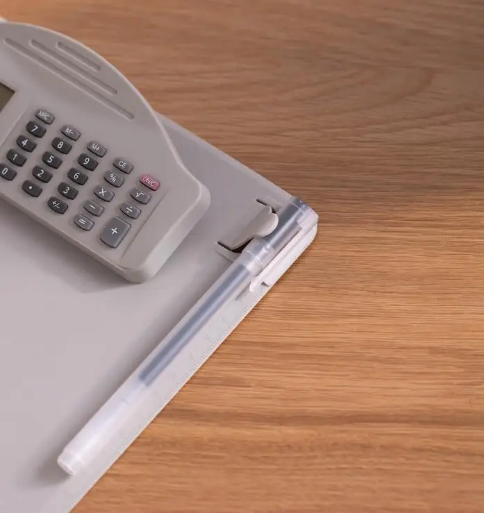 Plastic clipboard with calculator
