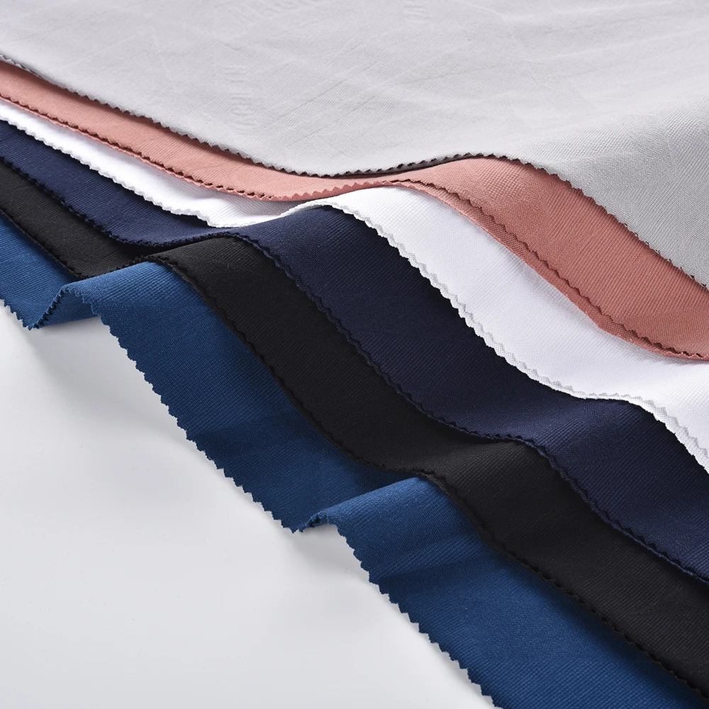 Guangzhou High Quality Jacquard Knitted Fabrics Manufacturer 8% Spandex 46% Tencel 46% Cotton Knitted Fabric For Clothing