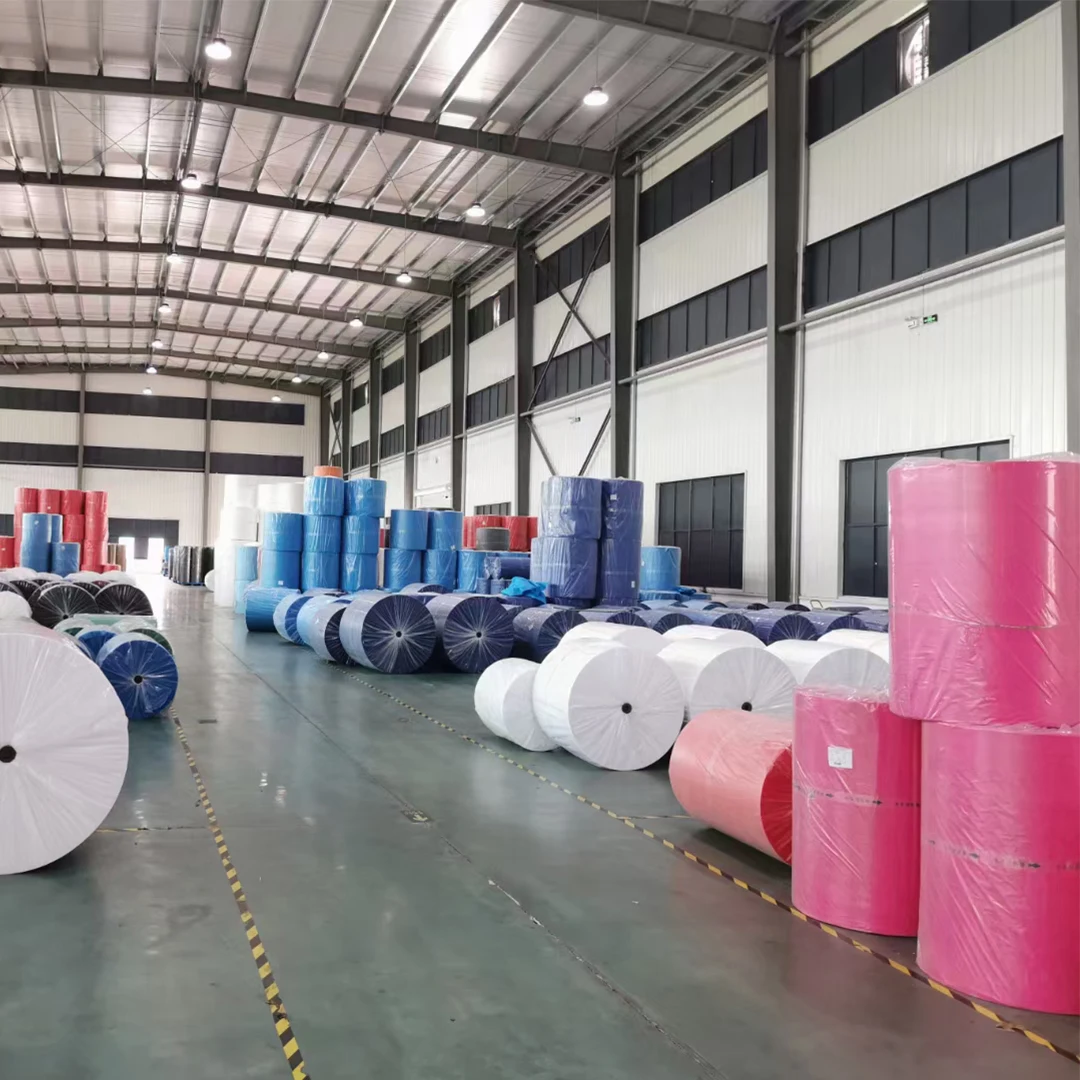Color PP Nonwoven fabric Raw Material Spunbond Nonwoven Fabric In Roll For FFP2 FFP3 Face Mask