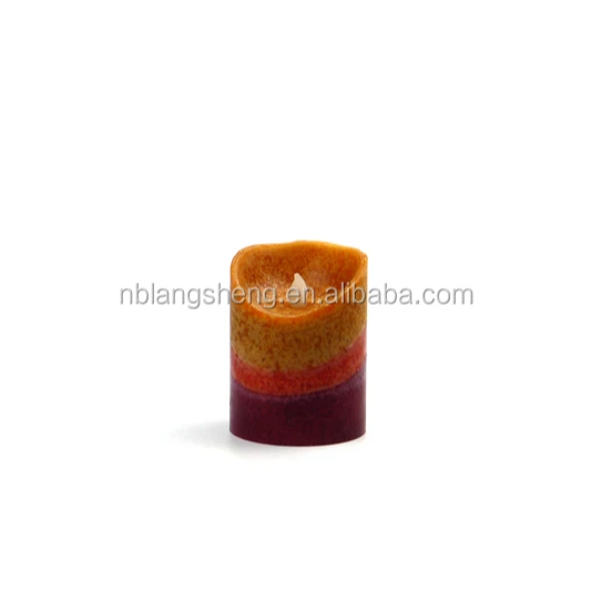 Three color LED candle with mottled surface melted top and 2AA battery