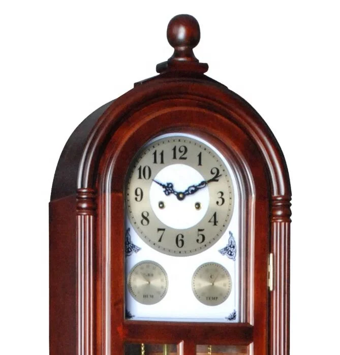 Wooden Floor Grandfather clock Aged to match the era, the antiqued dial offers Roman numerals, black serpentine hands