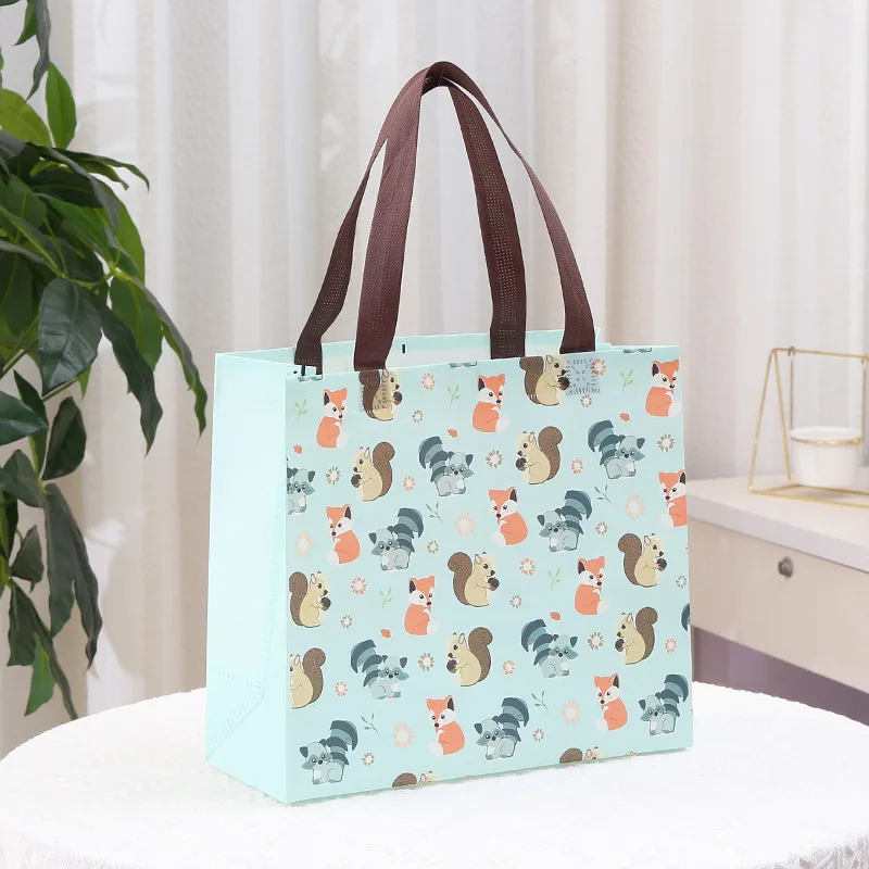 Three dimensional film covered non-woven bag color printing folding clothing store shopping bag cute birthday gift bag