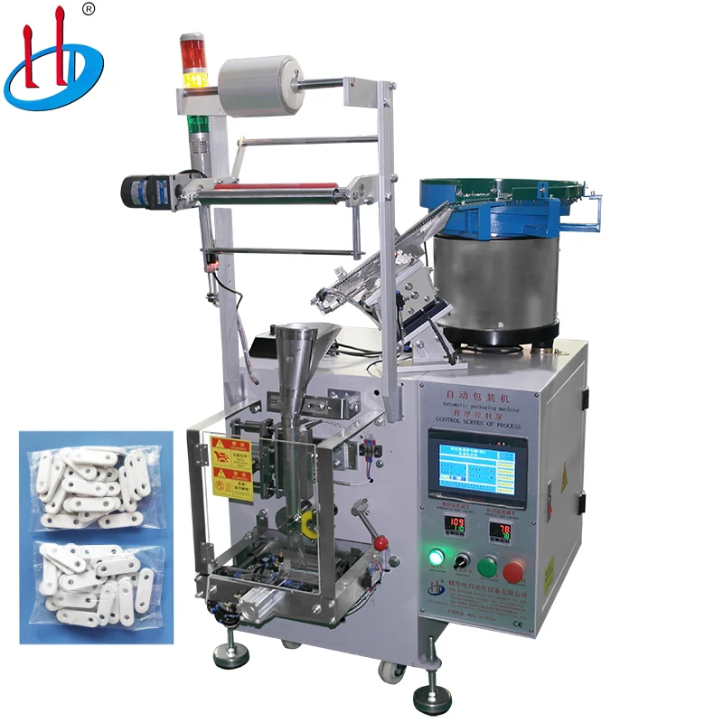 China Eco-Friendly Paper Film Small Plastic Part Wrapping Machine Tissue Toys Filling Machine Packaging Machine Sealer