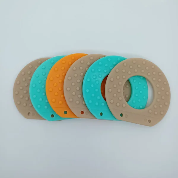 
Various Colours Round Plastic Silicone Teething Ring For Baby Toys 