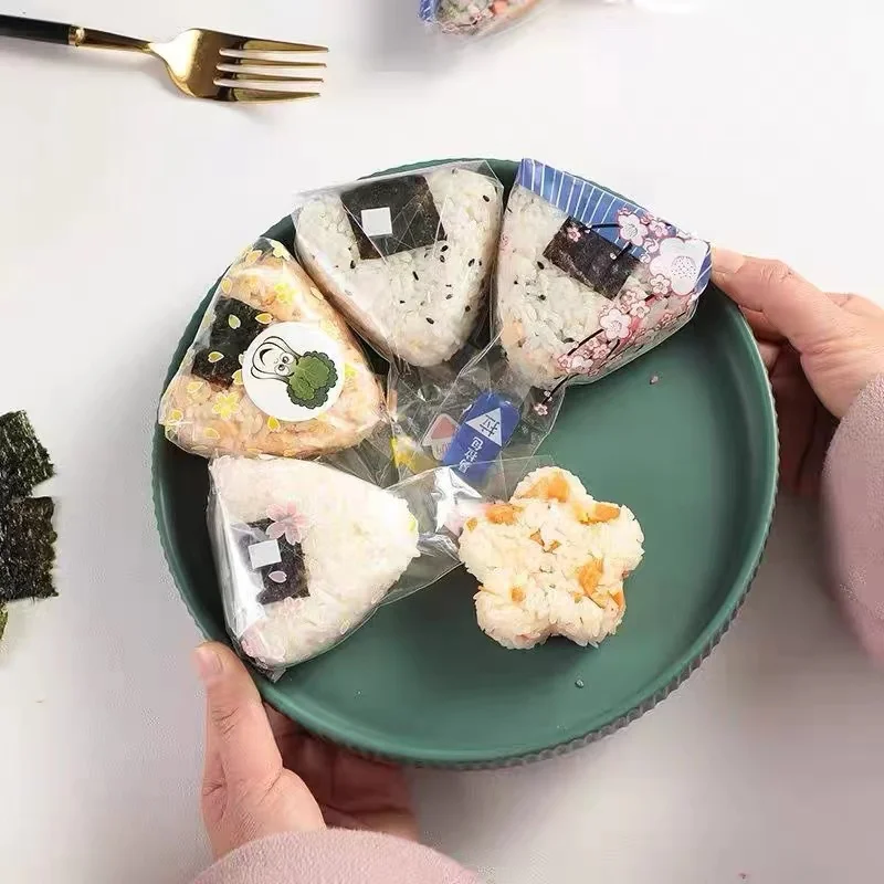 Безопасные пищевые пластиковые пакеты BOPP для onigiri треугольный рисовый шар пленочный пакет Бесплатная доставка в Россию