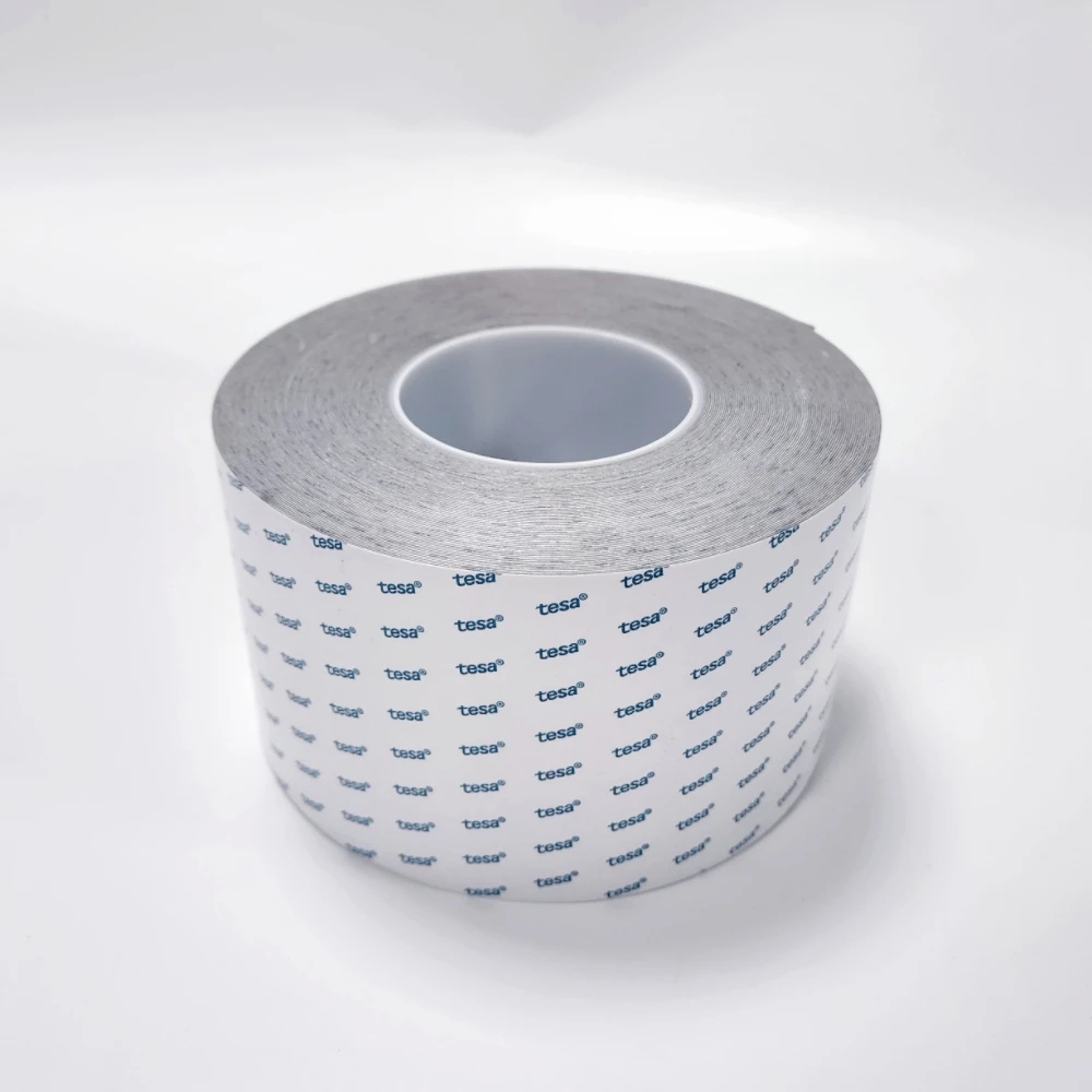 Tesa 6070 double-sided acrylic foam tape in grey color, the AC foam works both as backing and adhesive
