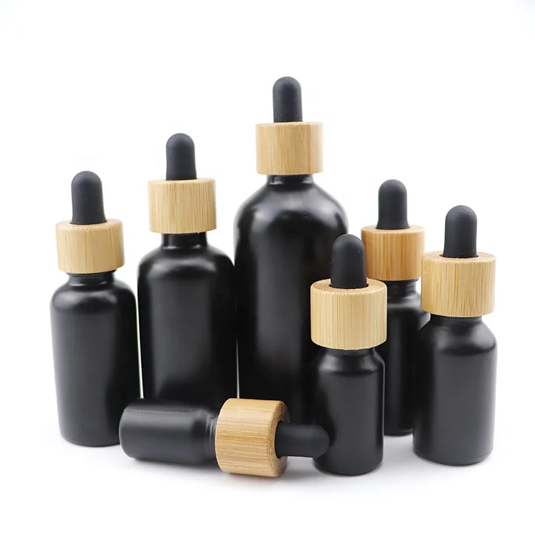 luxury empty packaging cosmetics bamboo 10 ml round black bottles 10ml glass essential oil dropper bottle for essential oils (1600373660723)