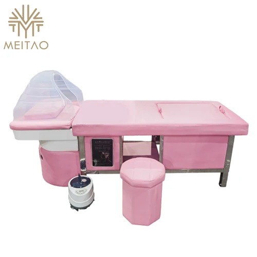 The Thai-style shampoo bed in the salon exudes a sense of tranquility and relaxation, reminiscent of a serene oasis.