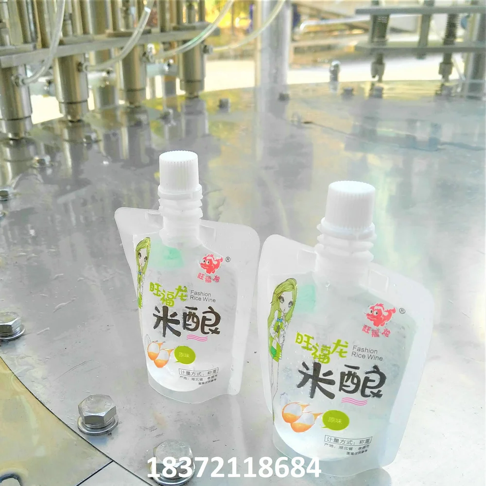 Automatic Doypack Hydrogen Water Milk Juice Spout Pouch Hot Filling Sealing Capping Machine