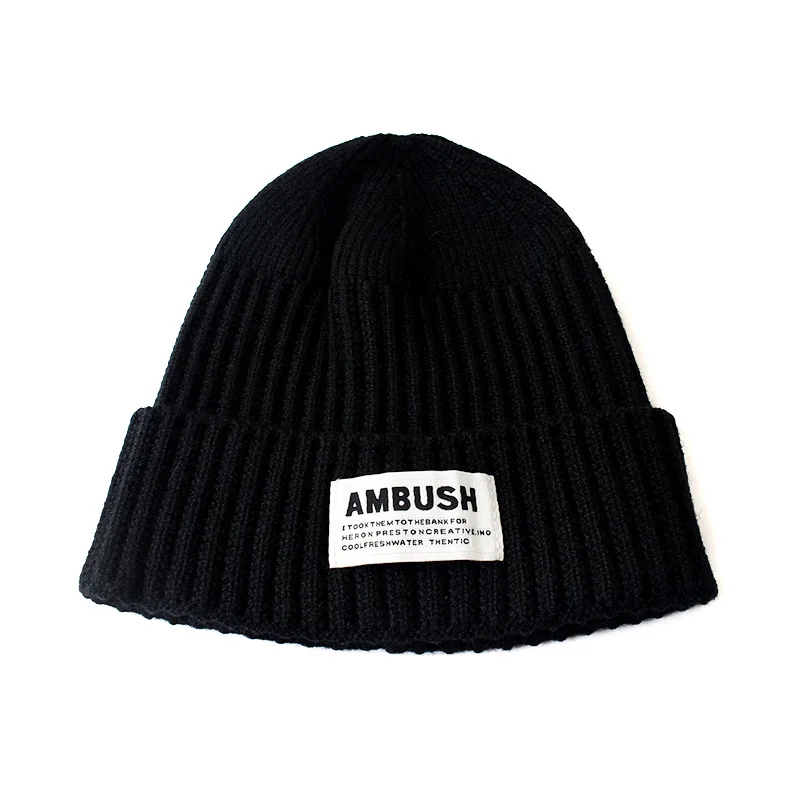 Hot sale wholesale knitted hat with custom logo knitted ear protection warm hat with cloth label for unisex