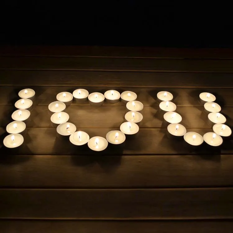 Unscented paraffin wax white tea light candles with 4 hour extended burn time