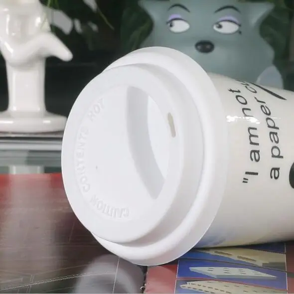 ceramic double wall ceramic mug with silicone lid and sleeve interior travel mug