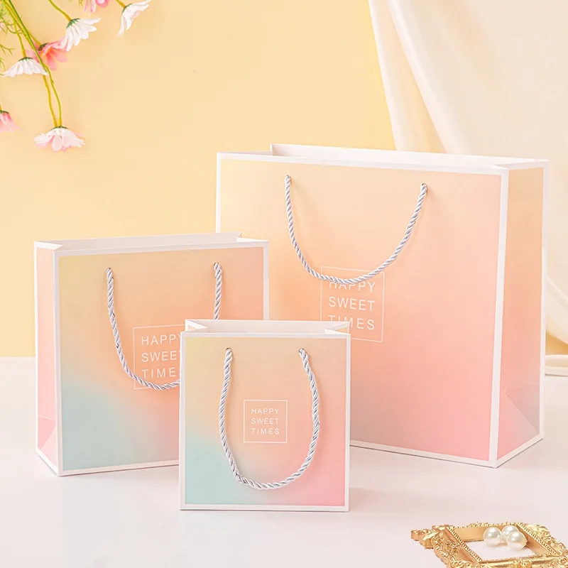 Luxury Custom Logo Shopping Paper Bag for Clothes with Gradient Color Clothing Boutique Packaging Bags with Ribbon Handles