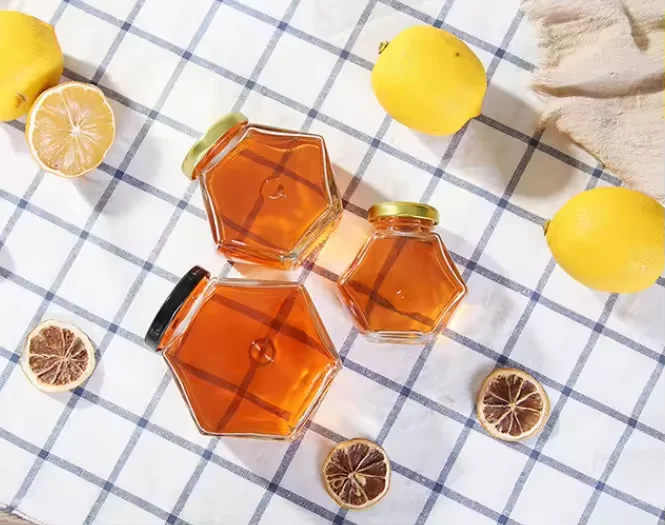 Hot Sale Transparent 100ml 220ml Hexagon Honey Glass Jar 380ml Glass Jars for Honey Storage Food Packaging With Wooden Lid