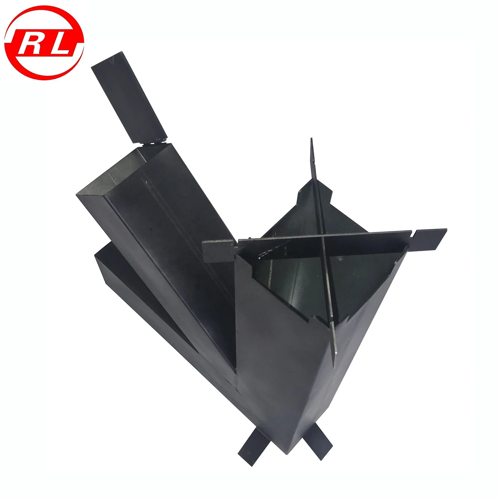 Stainless Steel Rocket Stove Loaded With Split Wood In The Vertical Chamber