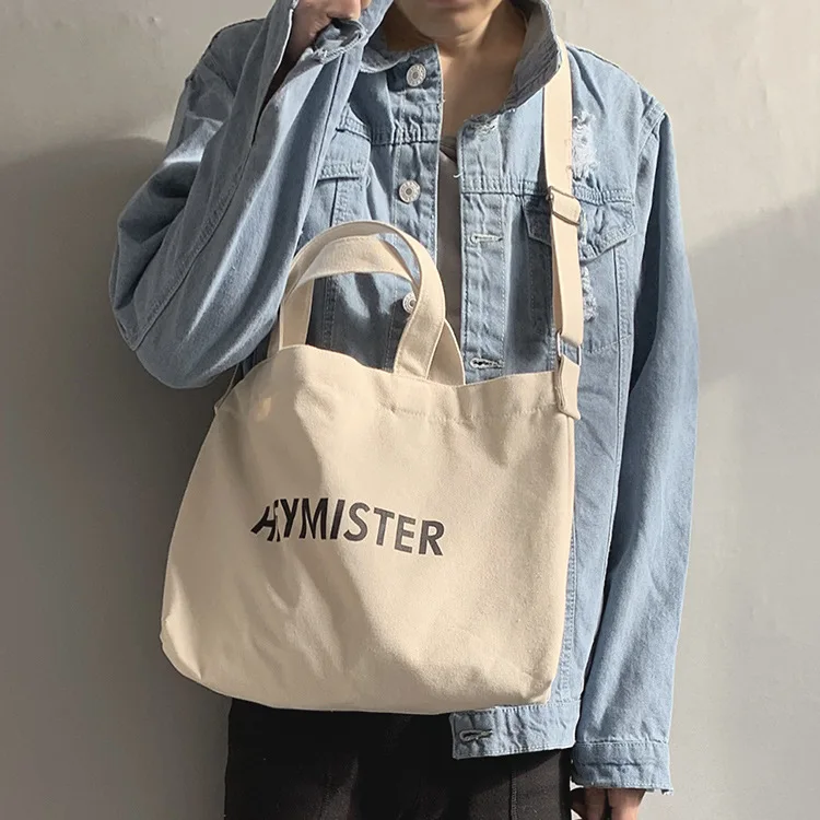 Wholesale Canvas Tote Bag Cross Body Messenger Bag Unisex Shopping Beach Travel Bag with Snap Customized Logo