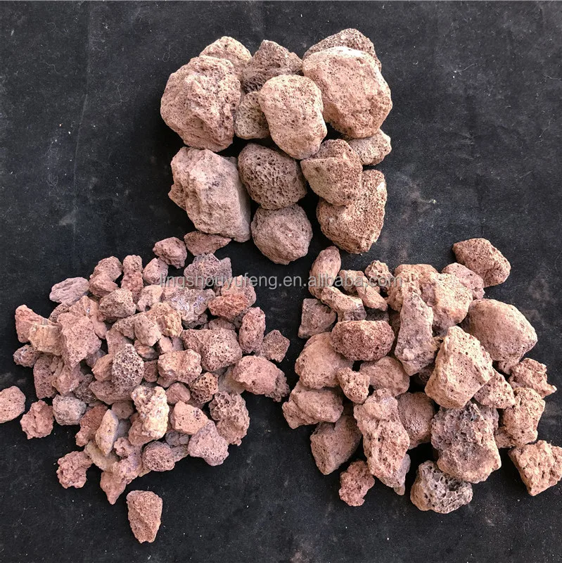 Red uniform granular volcanic rock for water filtration and river management