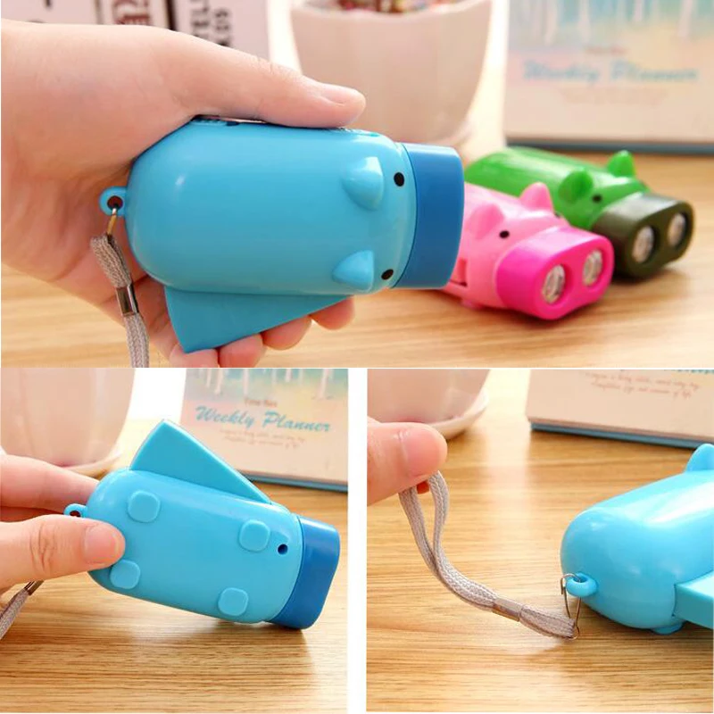 QXMOVING Cute Pig Shaped 2 LED Hand Crank Pressing Dynamo Mini LED Flashlight Emergency Usage