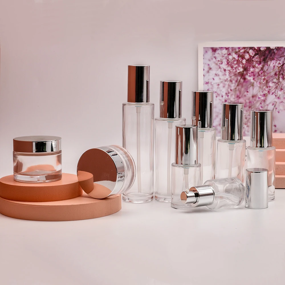 High Quality Luxury 50g 30g 30ml 50ml 100 ml Silver Lid Skincare packaging Glass Lotion Pump Bottle Jar Set for Cosmetics