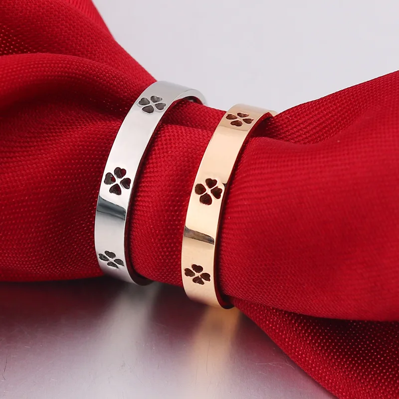 Европейская и американская мода ювелирные изделия титановая сталь полый Четырехлистный Клевер розовое золото серебро кольцо для женщин