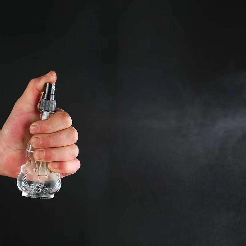 
Creative transparent glass spray bottle, violin perfume bottle Mini spot portable cosmetic packaging sub bottling 