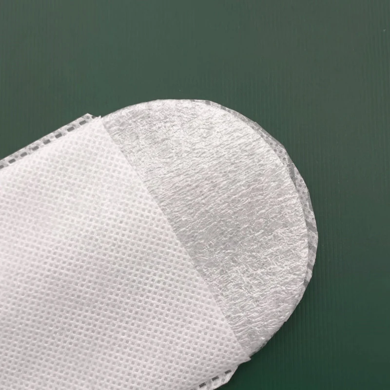 Wholesale cheap price non-woven fabric disposable slippers eco friendly sole spa and hotel slippers