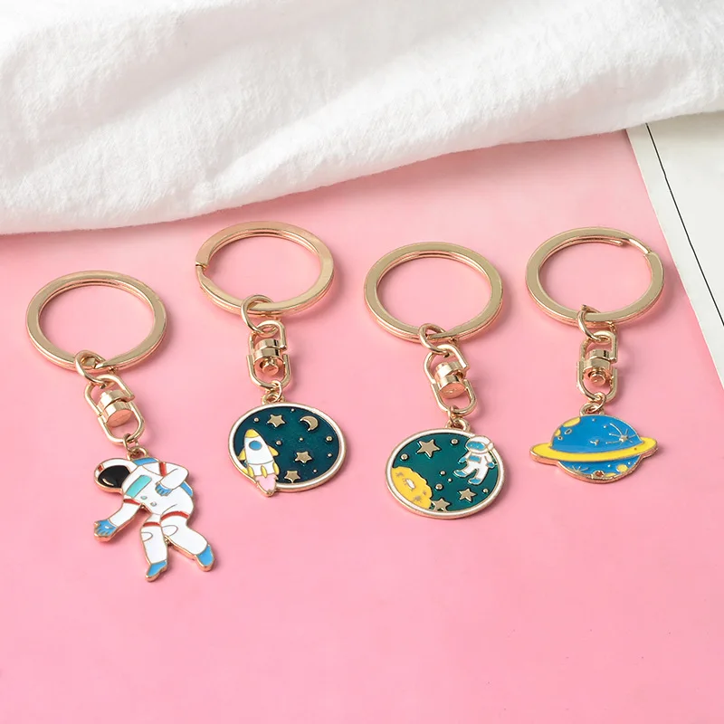4 Styles Escape from the earth ! UFO Space Craft Astronaut Rocket Planet Spaceman Universe Star Key Ring KeyChain For astrophile