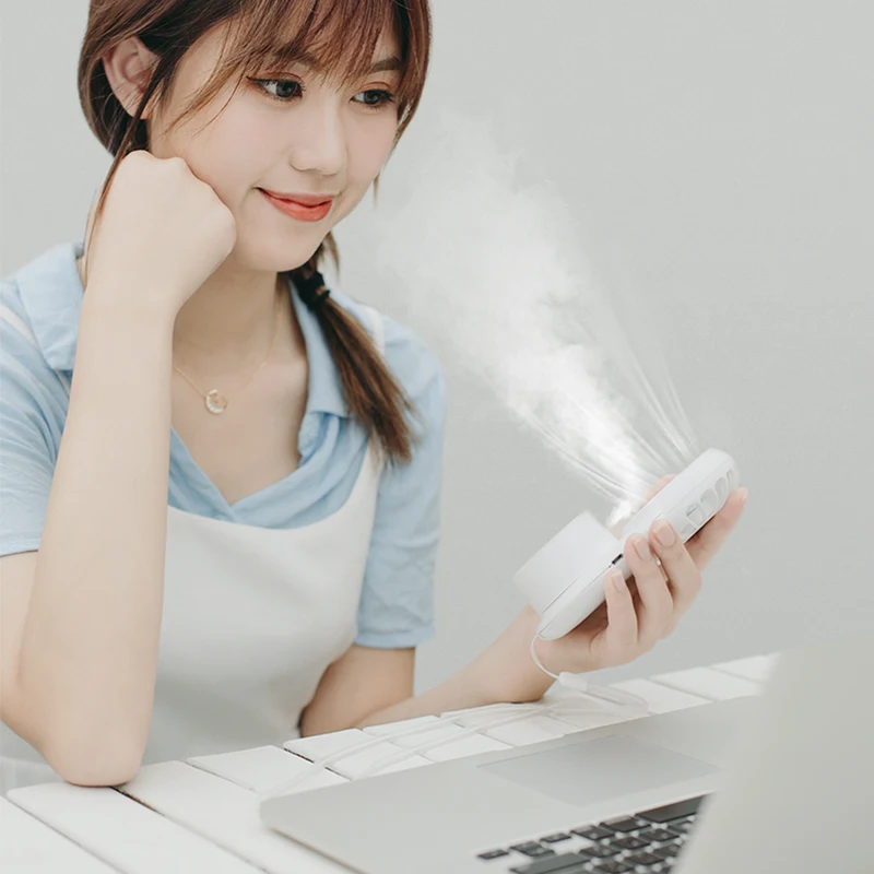 Free Sample wholesale 2022 new usb battery rechargeable  mini spray fan with humidifier handheld mini fan usb portable fan