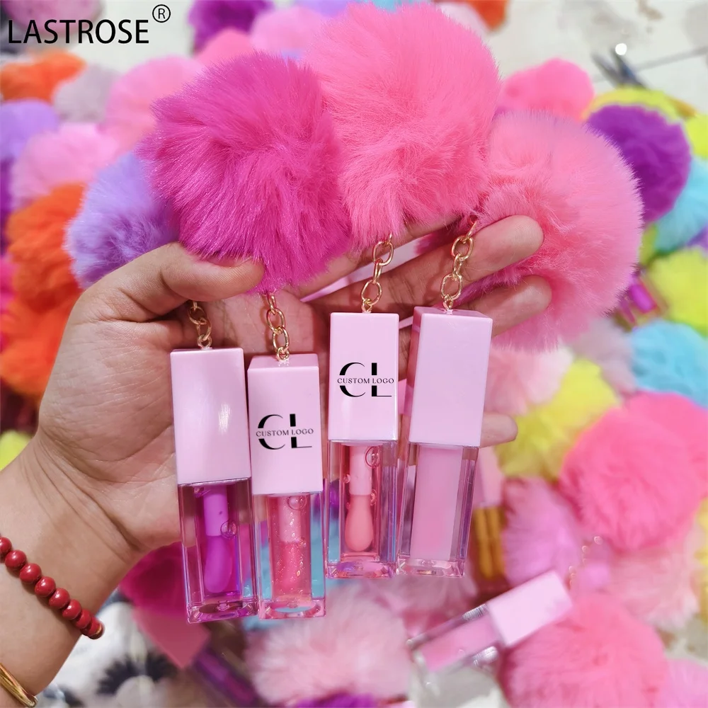 Color changing lip oil vegan glossy magic moisturizing fruit flavouring clear vegan pink lipgloss lip plumper oil with pompom