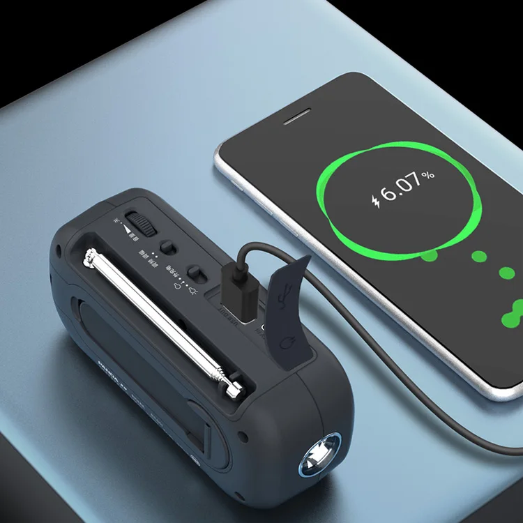 OEM Factory Portable Rechargeable Emergency Hand Crank 1200mah Radio with Phone Charger and LED Torch SOS Siren FM Radio