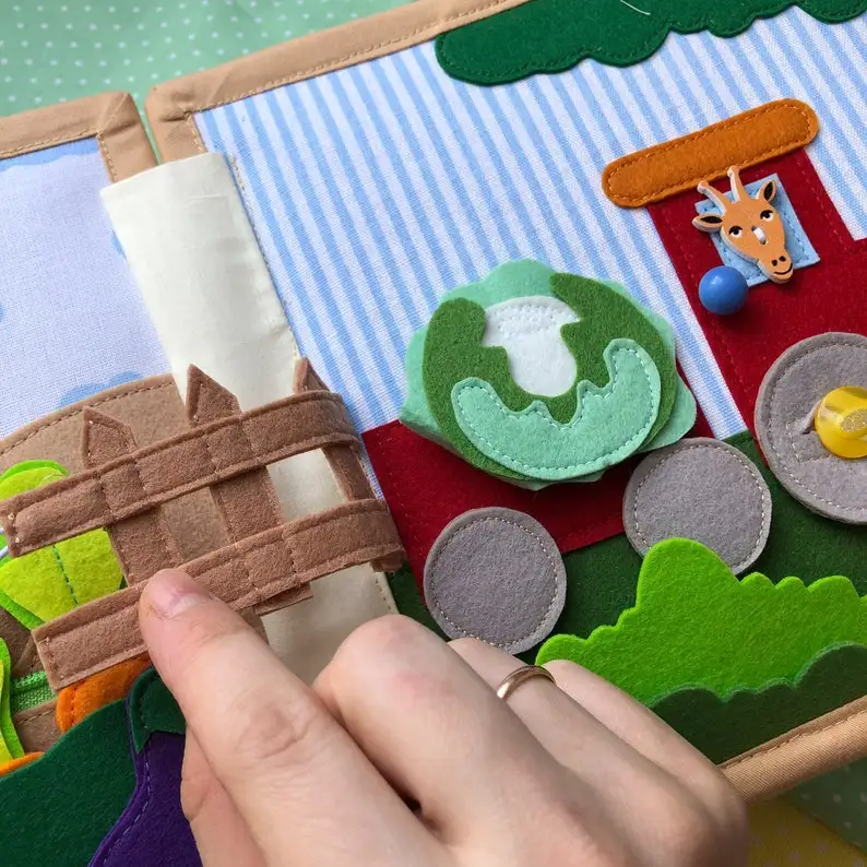 Professional manufacturing in soft baby activity binding silk quiet cloth book education memory for Children