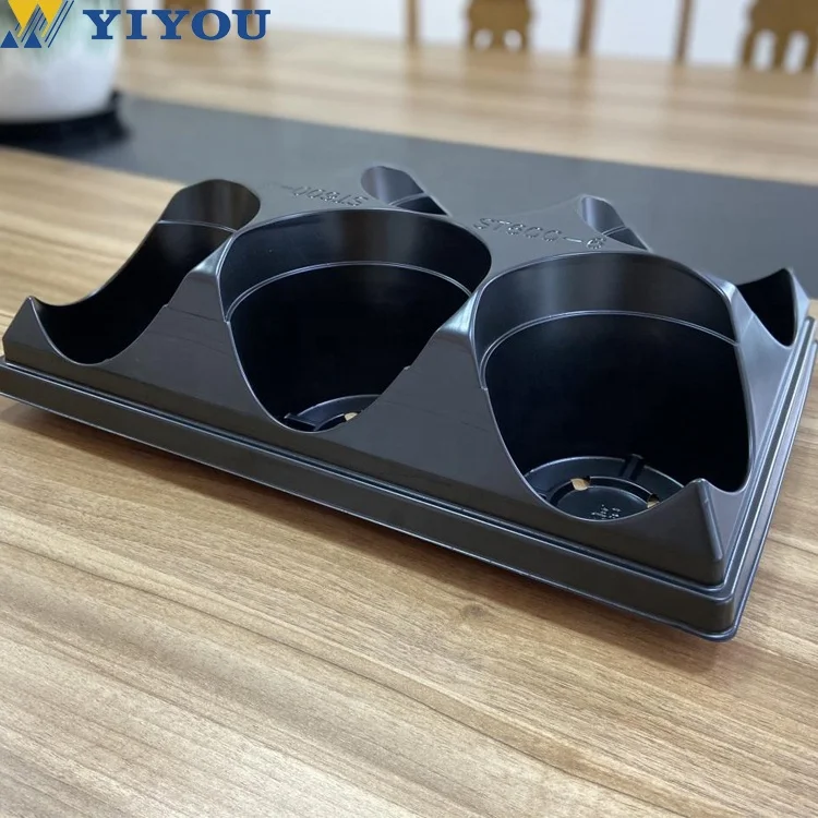 Multi station thermoforming machine for thermoforming tableware products