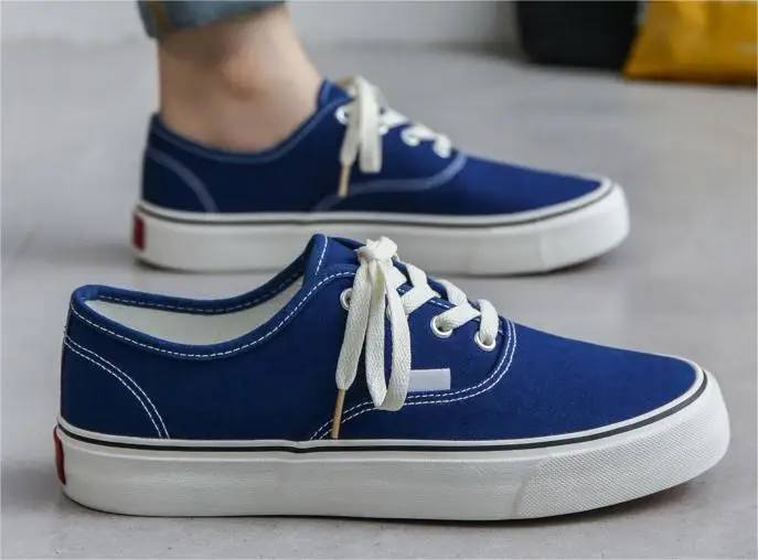 Wholesale custom fashionable low top lace up canvas shoes breathable mesh street walking sneakers