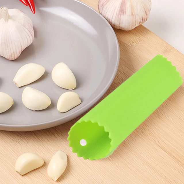 Wholesale High Quality Silicone Garlic Tube Peeler Easy Quick Skin Remover Roller Soft Kitchen Gadgets for Peeling Garlic Cloves
