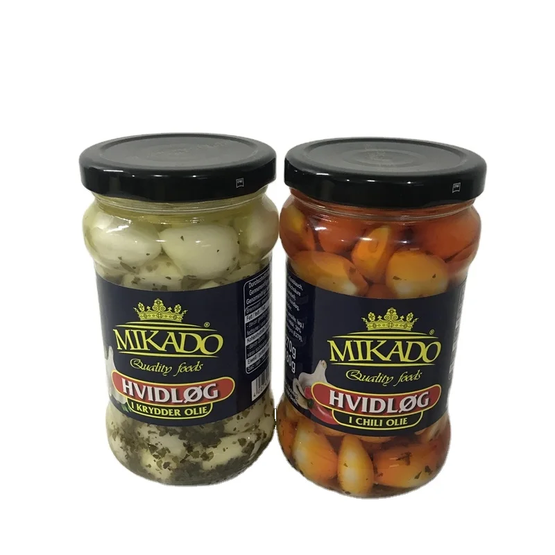 Chinese canned garlic clove with herbs in sunflower seed oil for sal