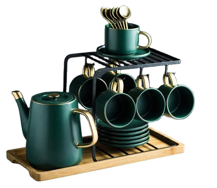 ceramic coffee /tea set in matte color glaze and gold desgin with metal standing teapot cup and saucer spoon