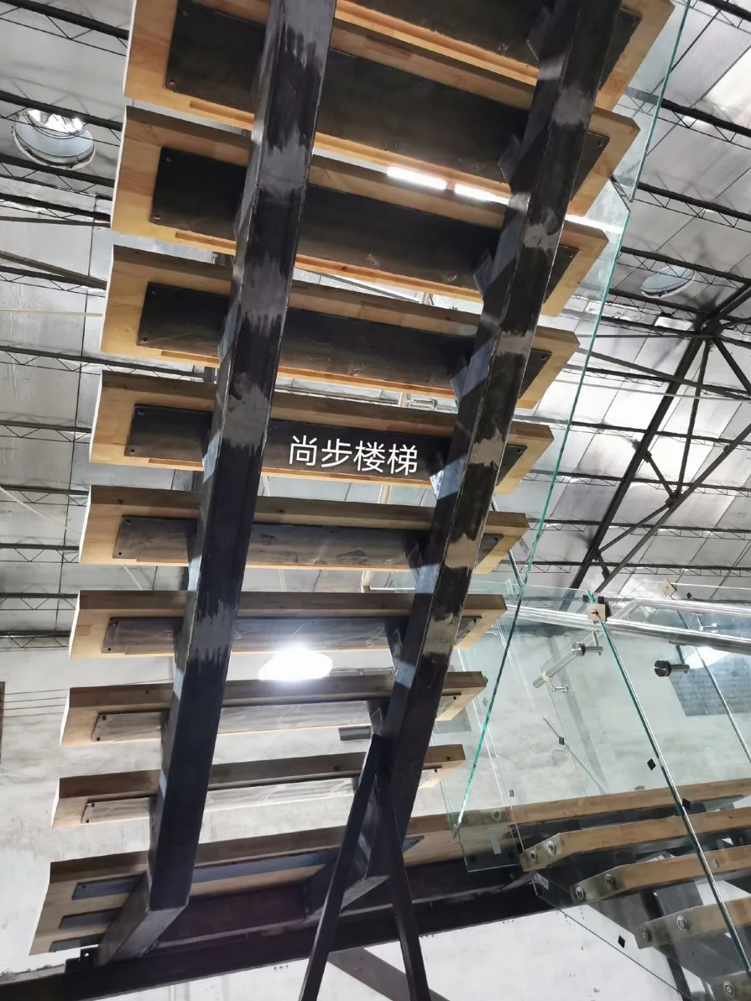 interior stair with tempered glass balustrade solid wood stair handrail dual stringer stair