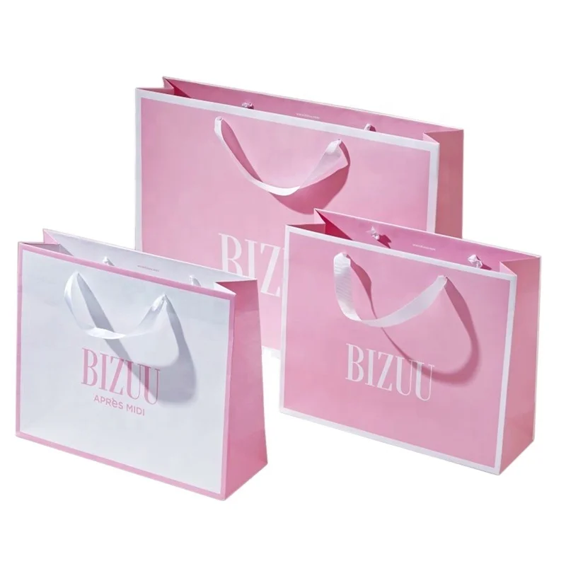 Custom logo printing luxury hot pink fashion shopping paper bag with ribbon handle