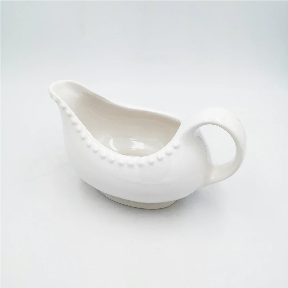 Wholesale cheap embossed dot White Easy-Pour Ceramic sauce Gravy Boat with